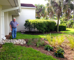 Farmer Fred, Mr Fred Burkey stands in front of the entrance of the new  rain garden at the Hoke Library in Jensen. (All photos by Jacqui Thurlow-Lippisch 9-27-14.)